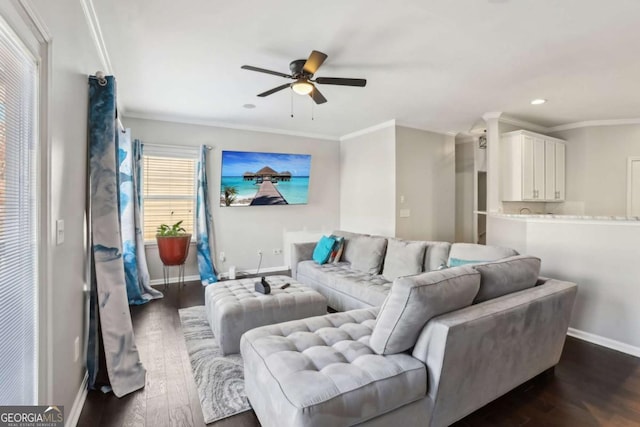 living room featuring ornamental molding, baseboards, ceiling fan, and dark wood-style flooring