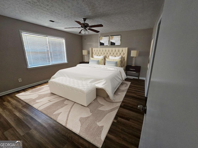432 Independence Dr, Jonesboro, GA 30238 - bedroom with a textured ceiling, baseboards, visible vents, a ceiling fan, and wood finished floors