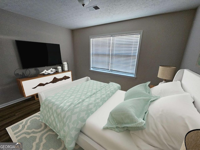 432 Independence Dr, Jonesboro, GA 30238 - bedroom featuring visible vents, baseboards, wood finished floors, and a textured ceiling