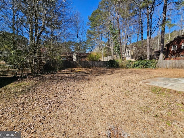 view of yard with fence