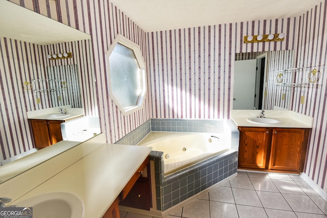 full bath featuring wallpapered walls, two vanities, and a sink