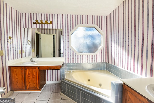 bathroom with vanity, tile patterned flooring, and wallpapered walls