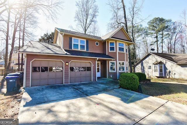 traditional home with concrete driveway