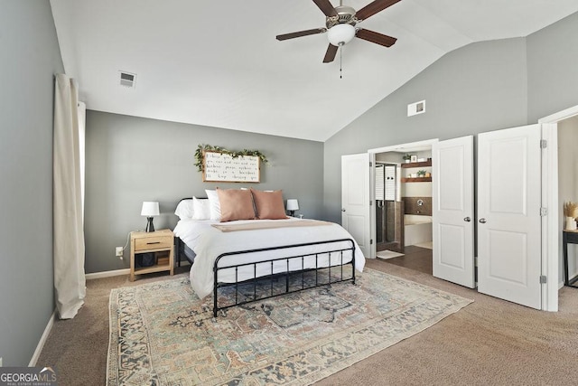 bedroom with vaulted ceiling, visible vents, and carpet floors