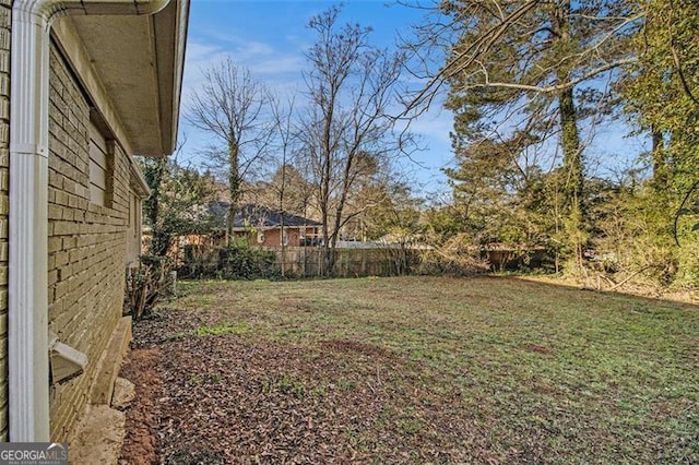 view of yard featuring fence