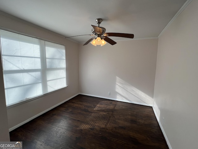 empty room featuring baseboards, wood finished floors, ceiling fan, and crown molding