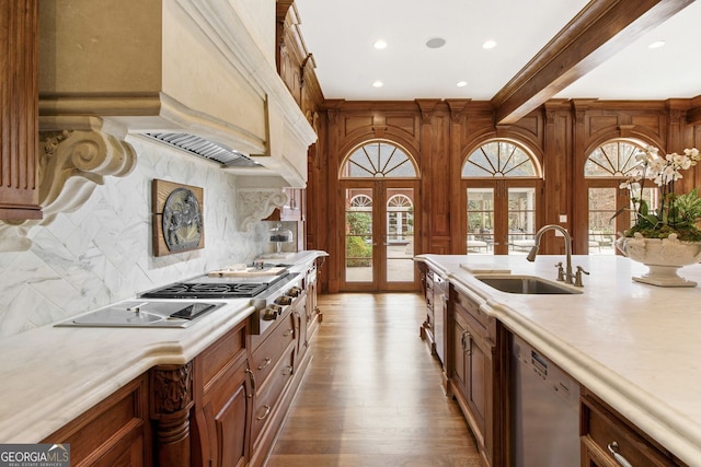 0 Winterthur, Sandy Springs, GA 30328 - kitchen featuring a sink, french doors, appliances with stainless steel finishes, light countertops, and light wood finished floors