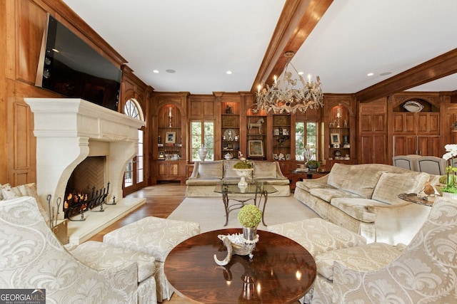 0 Winterthur, Sandy Springs, GA 30328 - living area featuring beamed ceiling, a warm lit fireplace, light wood finished floors, and wood walls