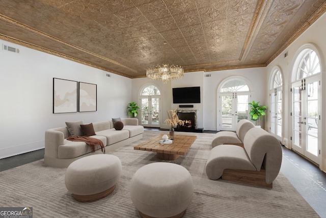 0 Winterthur, Sandy Springs, GA 30328 - living room with a chandelier, an ornate ceiling, ornamental molding, french doors, and baseboards