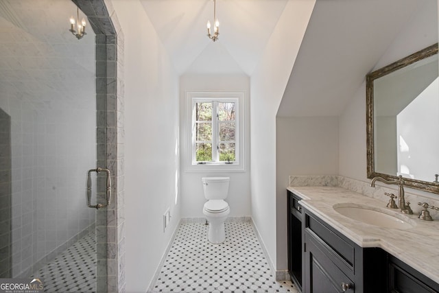 0 Winterthur, Sandy Springs, GA 30328 - bathroom with a shower stall, vanity, toilet, lofted ceiling, and baseboards