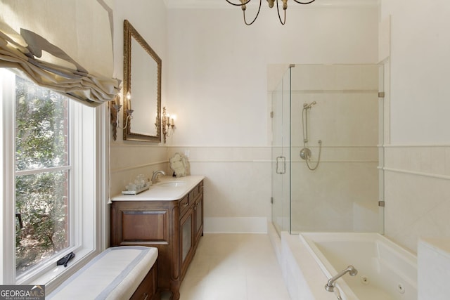 0 Winterthur, Sandy Springs, GA 30328 - bathroom featuring a stall shower, healthy amount of natural light, a jetted tub, vanity, and a wainscoted wall