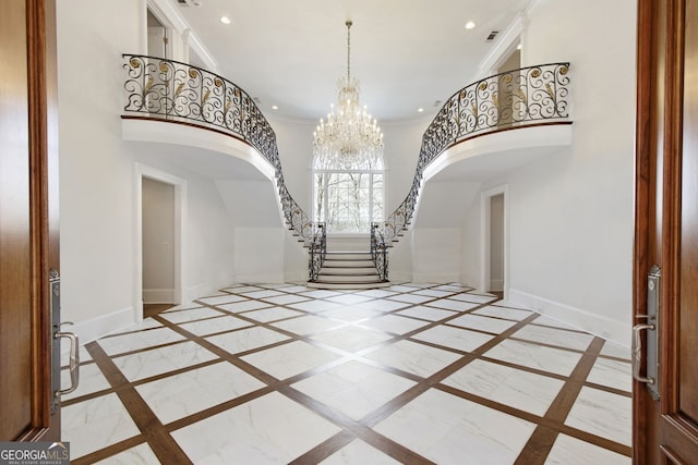 0 Winterthur, Sandy Springs, GA 30328 - foyer entrance featuring inlaid floor details, arched walkways, baseboards, recessed lighting, and ornamental molding