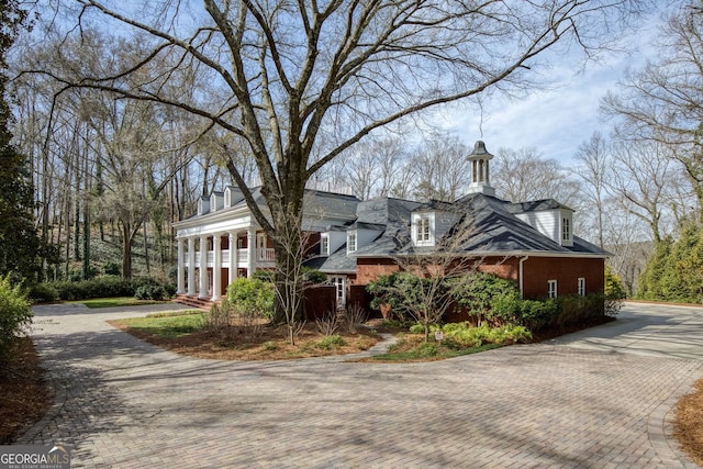 0 Winterthur, Sandy Springs, GA 30328 - view of side of home featuring decorative driveway and brick siding