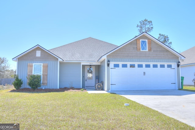 ranch-style home featuring driveway, an attached garage, a front yard, and a shingled roof