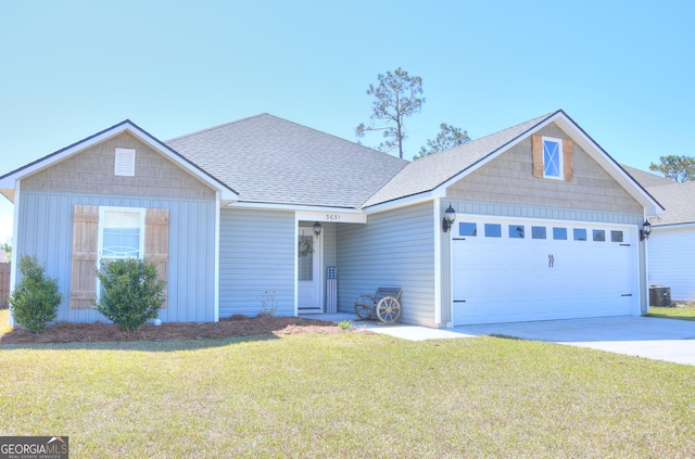 ranch-style home with a front yard, an attached garage, concrete driveway, and a shingled roof