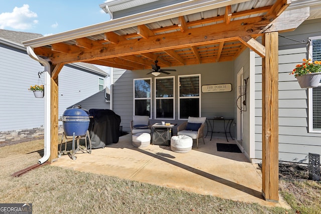 view of patio featuring grilling area and ceiling fan