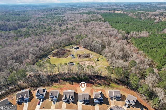 aerial view with a forest view and a residential view