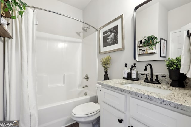 bathroom with vanity, toilet, and shower / tub combo with curtain