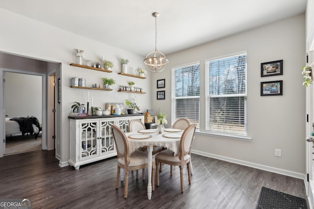 dining area featuring baseboards, an inviting chandelier, dark wood finished floors, and a dry bar