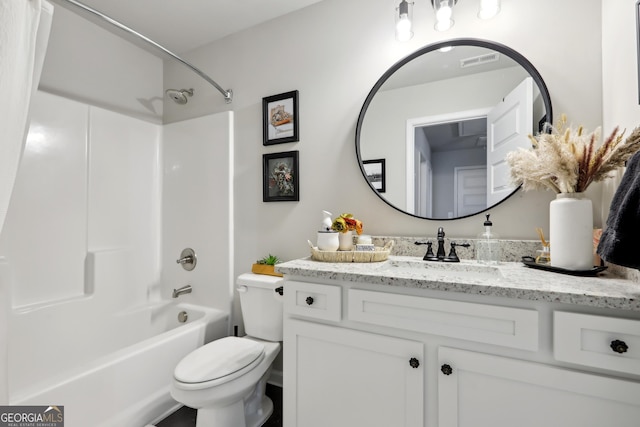 bathroom with vanity, toilet, bathtub / shower combination, and visible vents