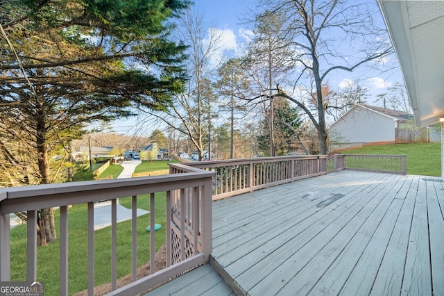 wooden deck with a yard