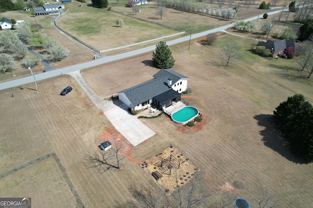 bird's eye view with a rural view