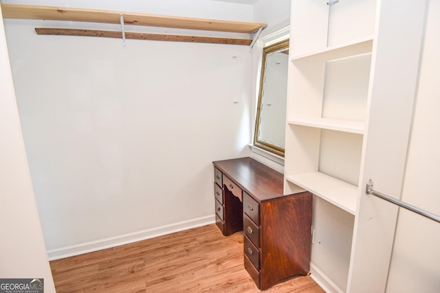 spacious closet with light wood-type flooring