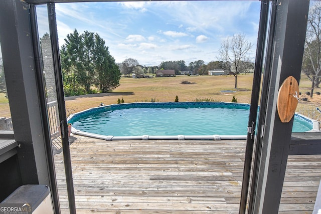 view of pool featuring a deck