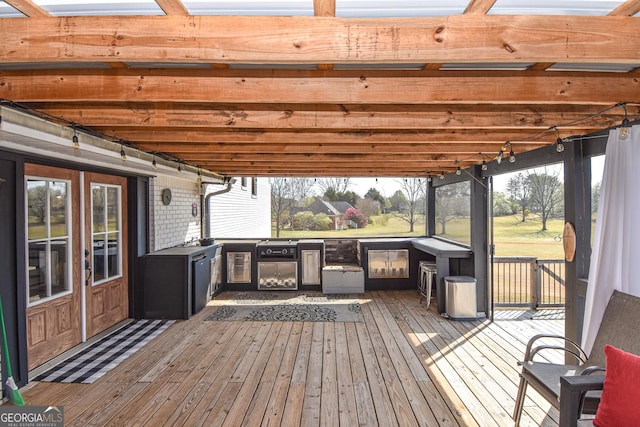 deck with exterior kitchen