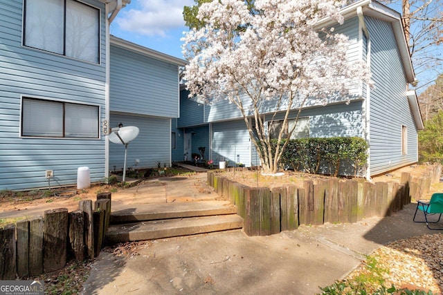 exterior space featuring a patio area and fence