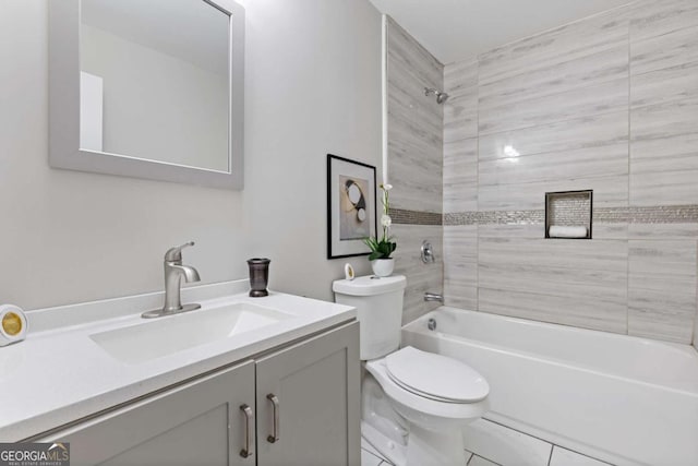 bathroom with toilet, vanity, and bathtub / shower combination