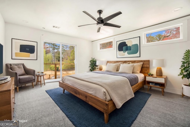 bedroom with access to exterior, visible vents, ceiling fan, baseboards, and carpet