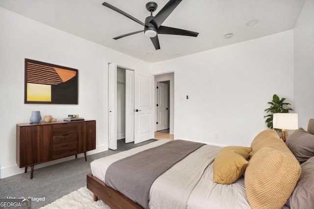 bedroom featuring baseboards, carpet, and a ceiling fan