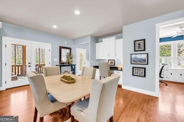 dining space with recessed lighting, french doors, light wood-type flooring, and baseboards