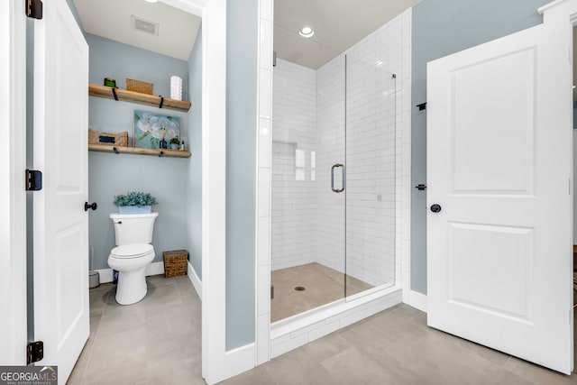 full bath with baseboards, visible vents, tile patterned flooring, a shower stall, and toilet