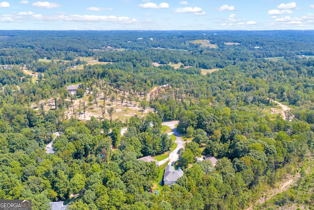 aerial view featuring a forest view