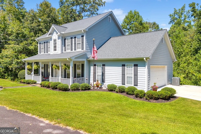 colonial-style house with a front yard, driveway, roof with shingles, covered porch, and a garage