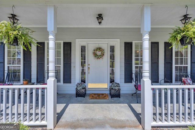 entrance to property with covered porch