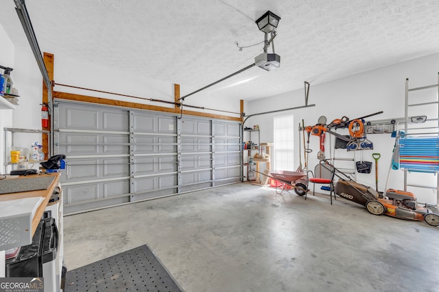 garage featuring a garage door opener