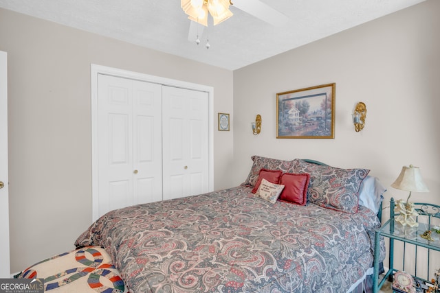 bedroom featuring a closet and ceiling fan