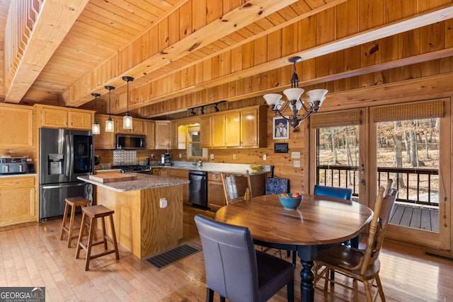 21 Trails End Ln Unit 339, Morganton, GA 30560 - dining room with light wood finished floors, a wooden ceiling with exposed beams, a chandelier, and wood walls