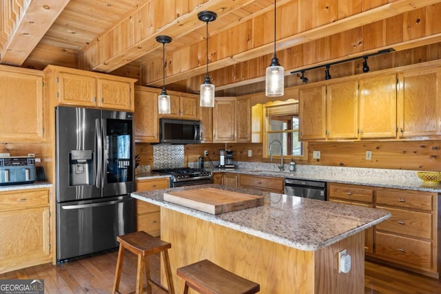 21 Trails End Ln Unit 339, Morganton, GA 30560 - kitchen with stainless steel appliances, a wooden ceiling with exposed beams, wood-type flooring, a center island, and light stone countertops