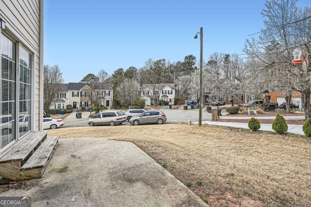 view of yard featuring a residential view