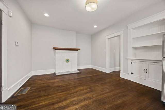 1769 Lyle Ave, Atlanta, GA 30337 - spare room featuring wood finished floors, recessed lighting, and built in shelves