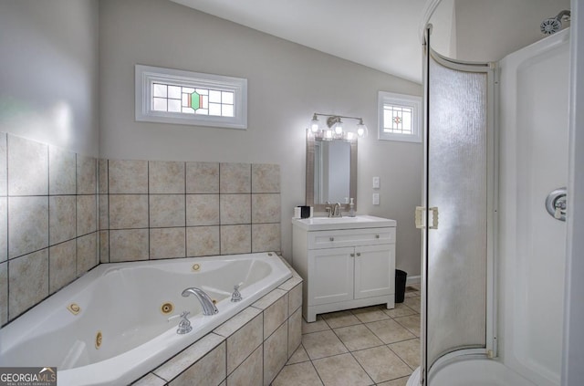 full bathroom featuring vanity, tile patterned floors, a whirlpool tub, and a shower stall