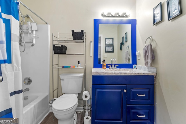 full bathroom with vanity, toilet, and shower / bath combo with shower curtain