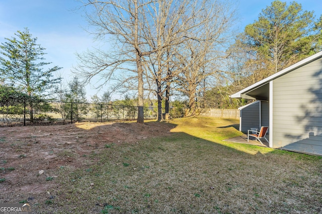 view of yard with a fenced backyard