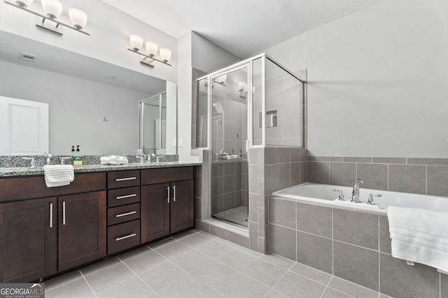 bathroom with visible vents, a stall shower, tile patterned flooring, and a bath