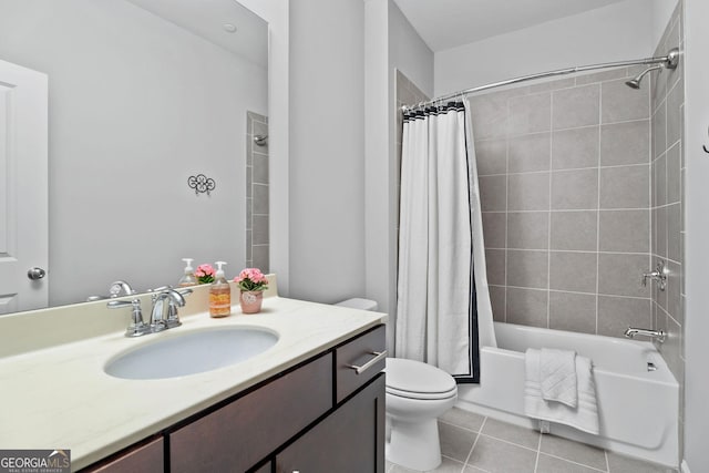 full bathroom featuring vanity, tile patterned floors, toilet, and shower / bath combo