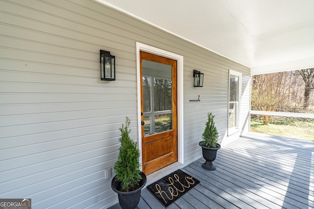 entrance to property with a porch